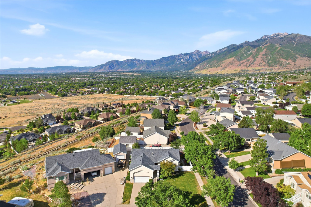 Neighborhood setting with mountain backdrop and established residential properties