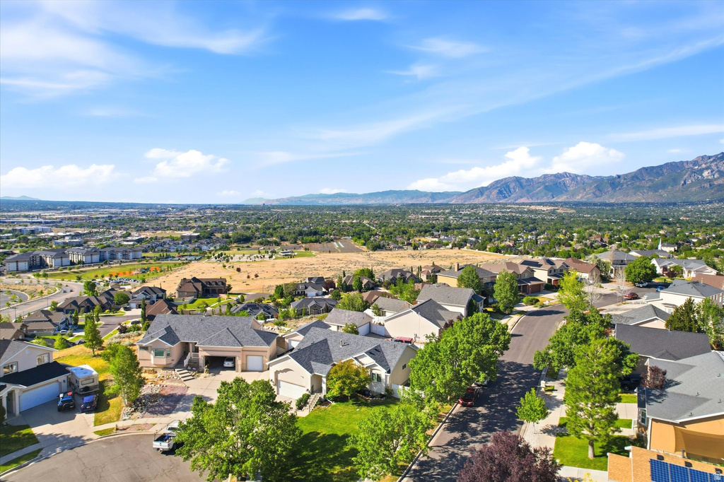 Expansive residential neighborhood with distant mountain backdrop