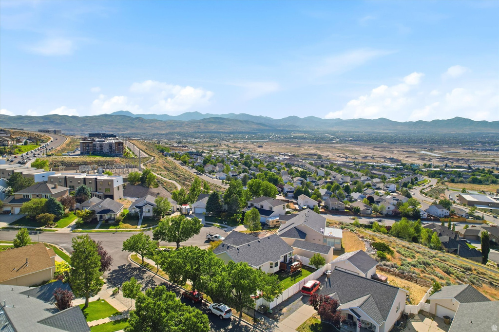Expansive aerial perspective showcasing a residential development with varied housing styles