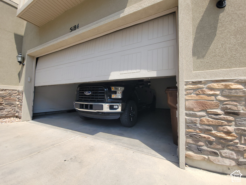 Single-car garage with a panel-style door