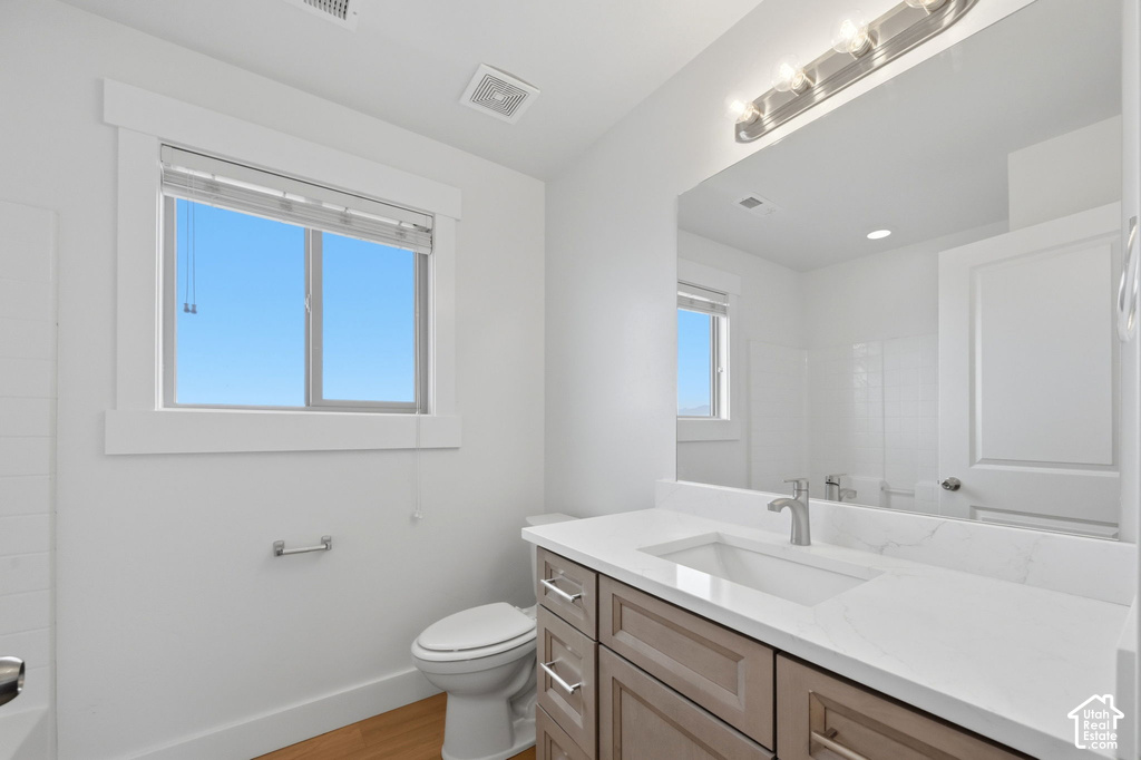 Contemporary bathroom vanity with a white countertop and undermount sink