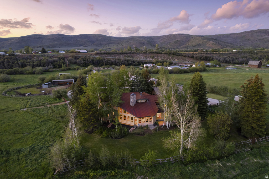 Property situated on expansive green grounds with mature trees