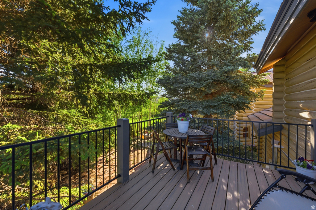 Outdoor deck with composite wood-finish flooring