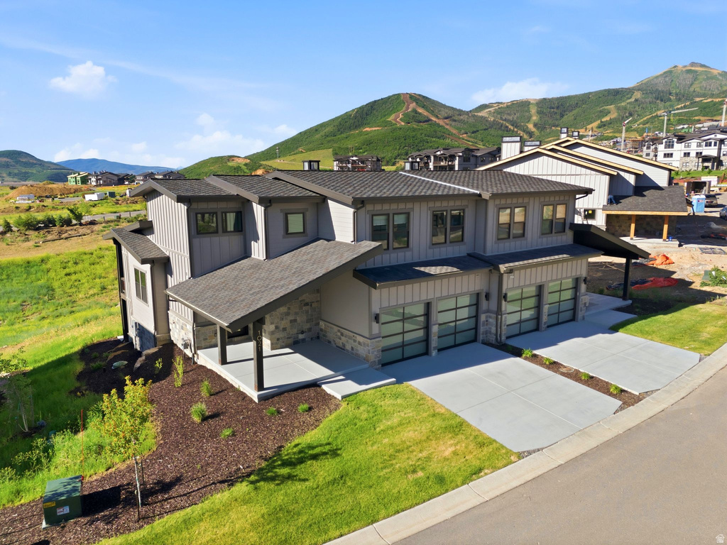 Modern exterior with a striking gray and stone façade