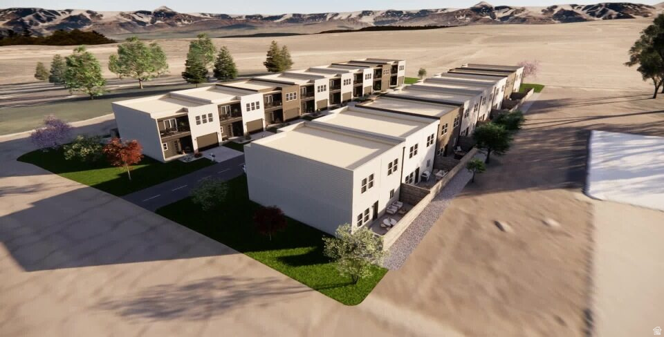 Modern townhome development featuring a row of multi-story residences