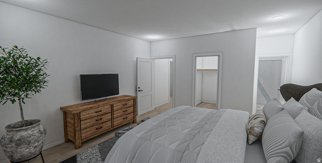 White wall finishes, recessed lighting, and light wood-finish flooring