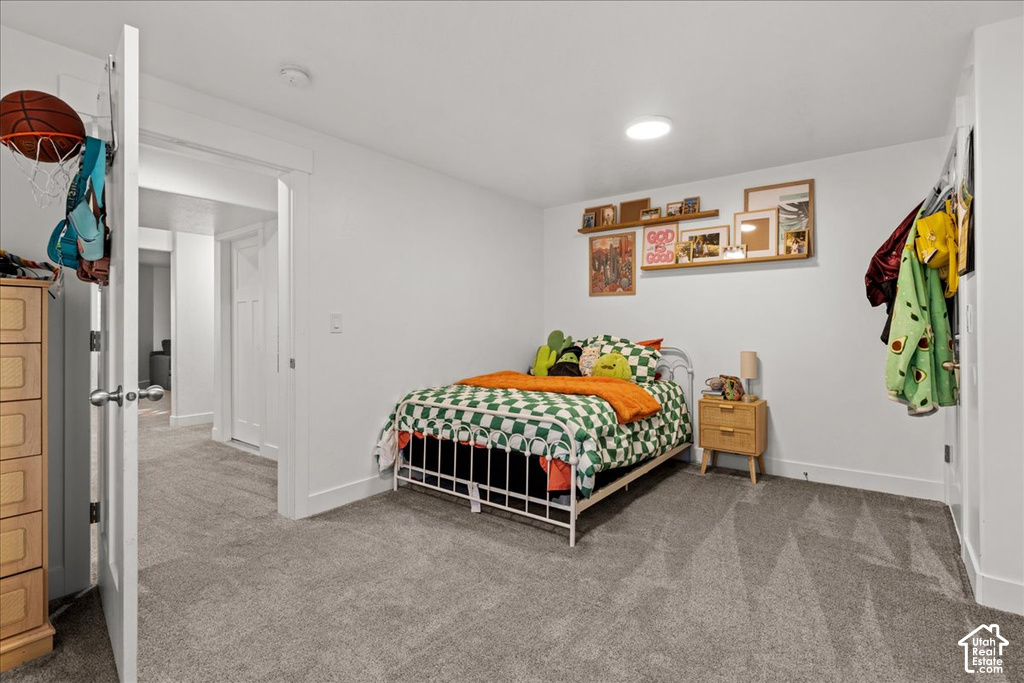 Room featuring neutral gray carpet flooring, white walls, recessed ceiling lighting, and white trim
