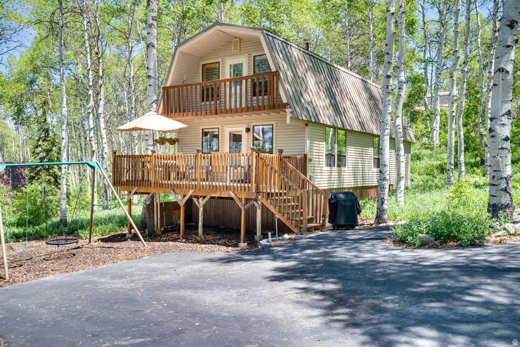 A-frame property featuring two levels of outdoor decking