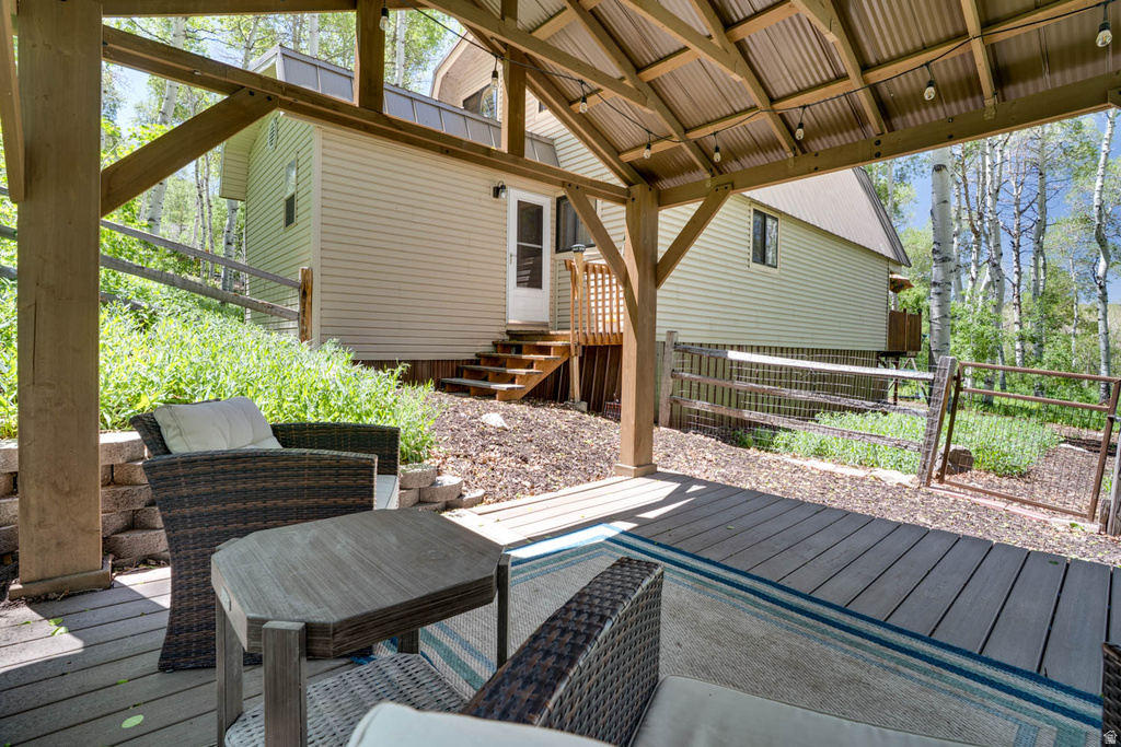 Covered outdoor deck with string lighting