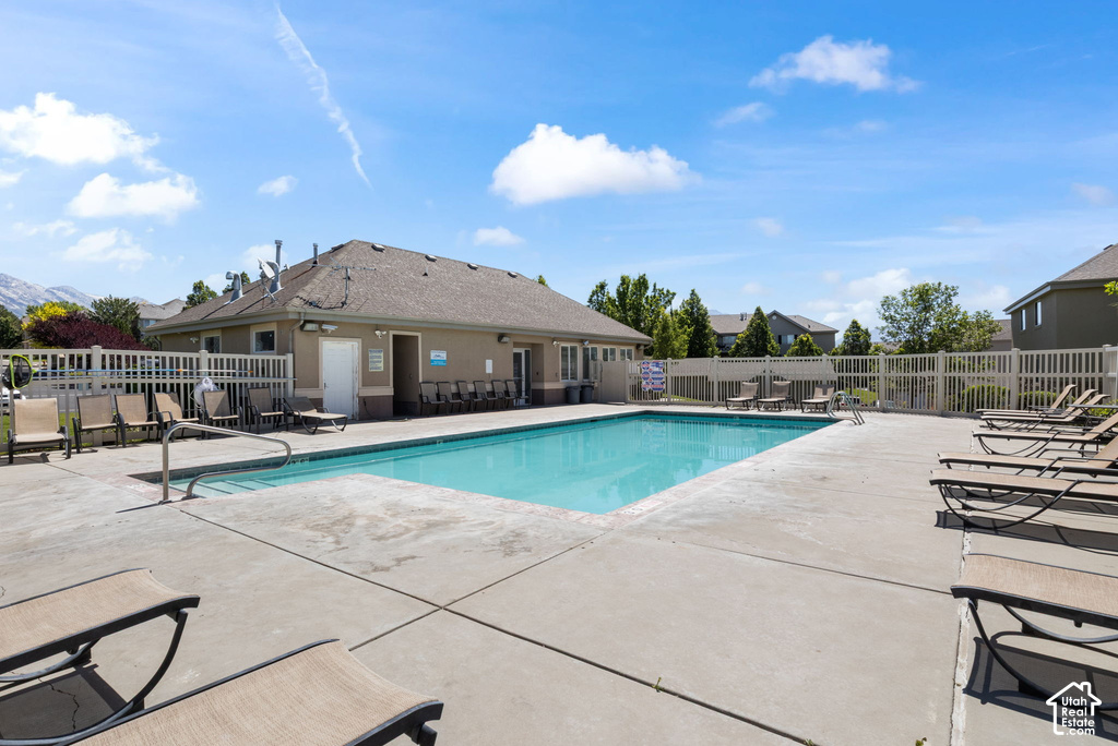 Rectangular swimming pool with a surrounding concrete deck