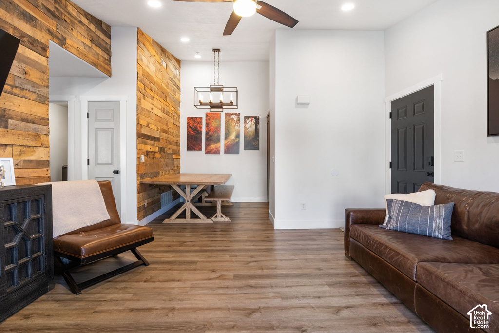 Open-concept living area featuring wood-finish flooring throughout