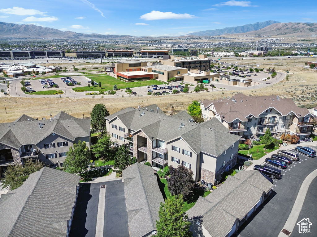Multi-story residential buildings featuring gabled roofs and private balconies