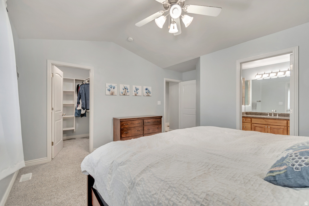 Interior room featuring light gray wall paint, a ceiling fan with integrated lighting, and carpet flooring
