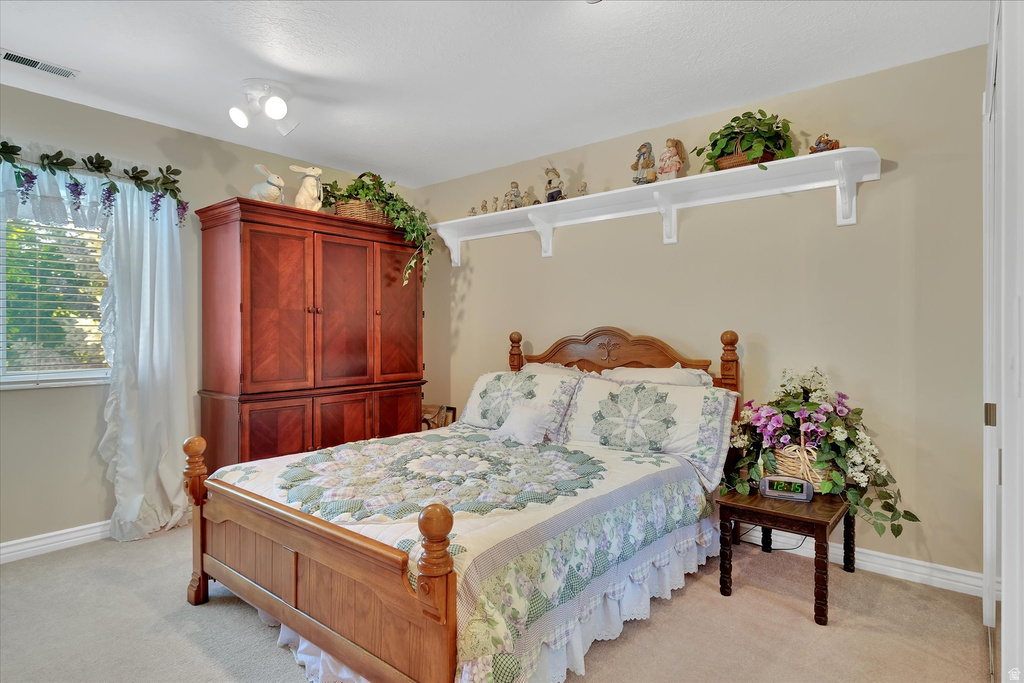Neutral tone wall paint with white trim baseboards
