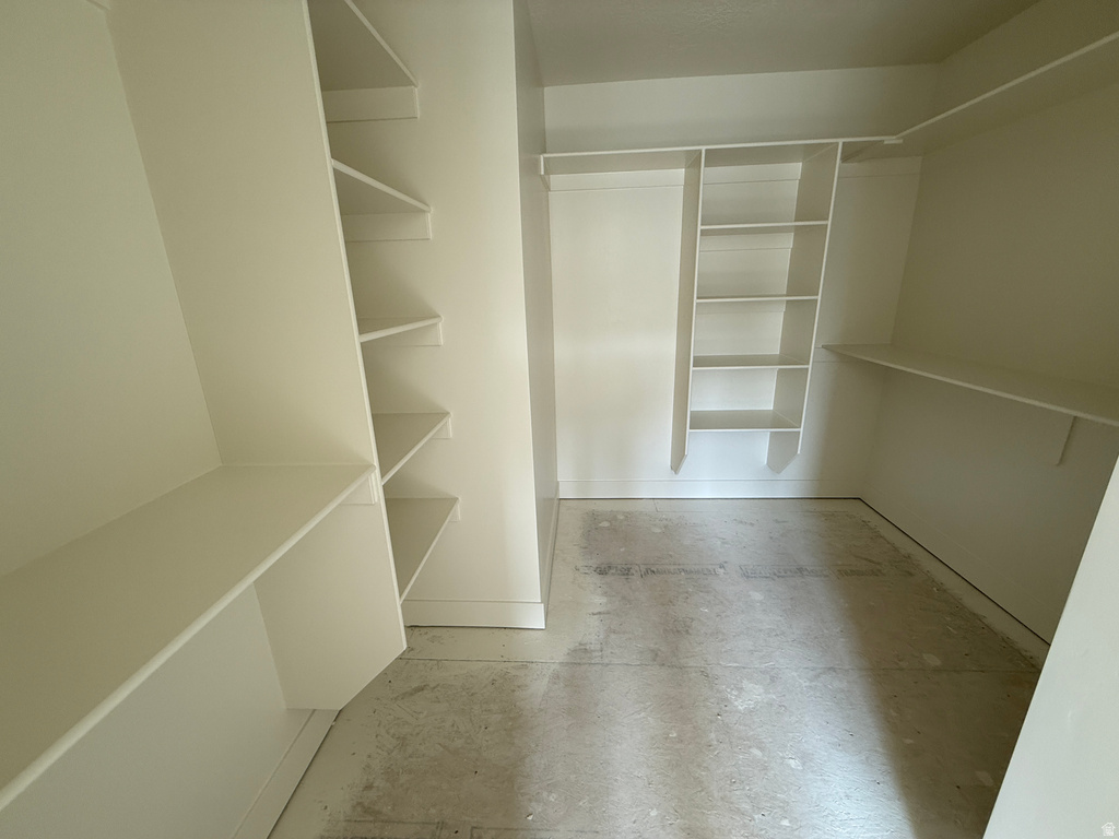 Built-in shelving units, integrated closet rods, and baseboard trim
