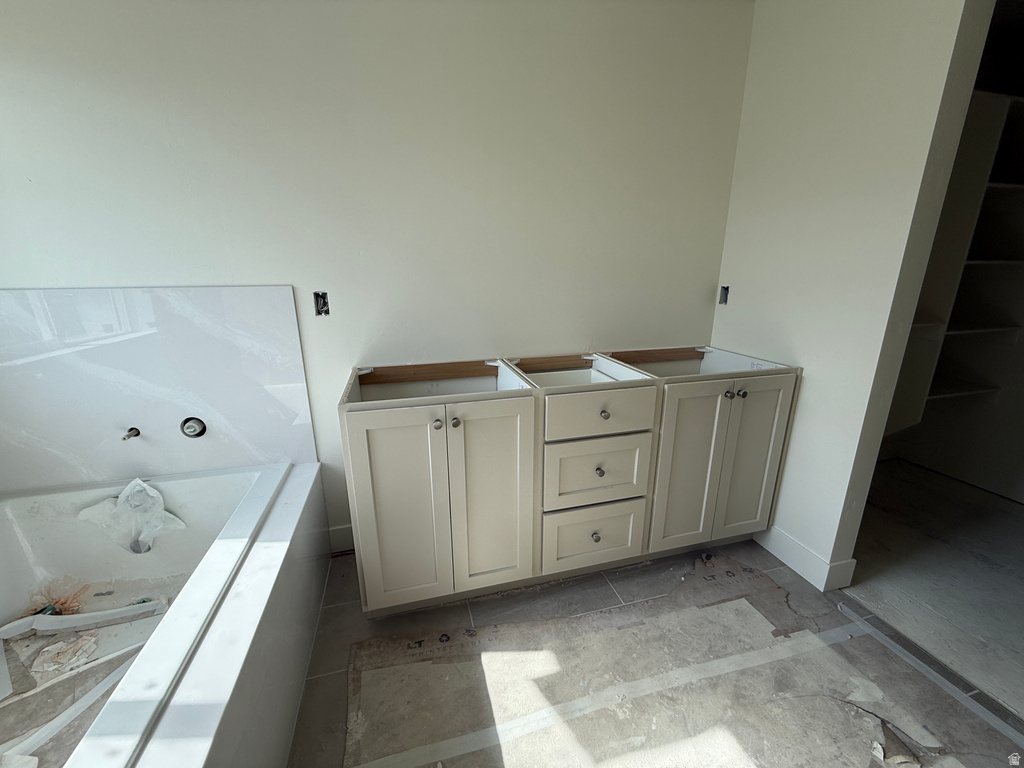 Built-in vanity cabinetry with shaker-style doors and drawer fronts