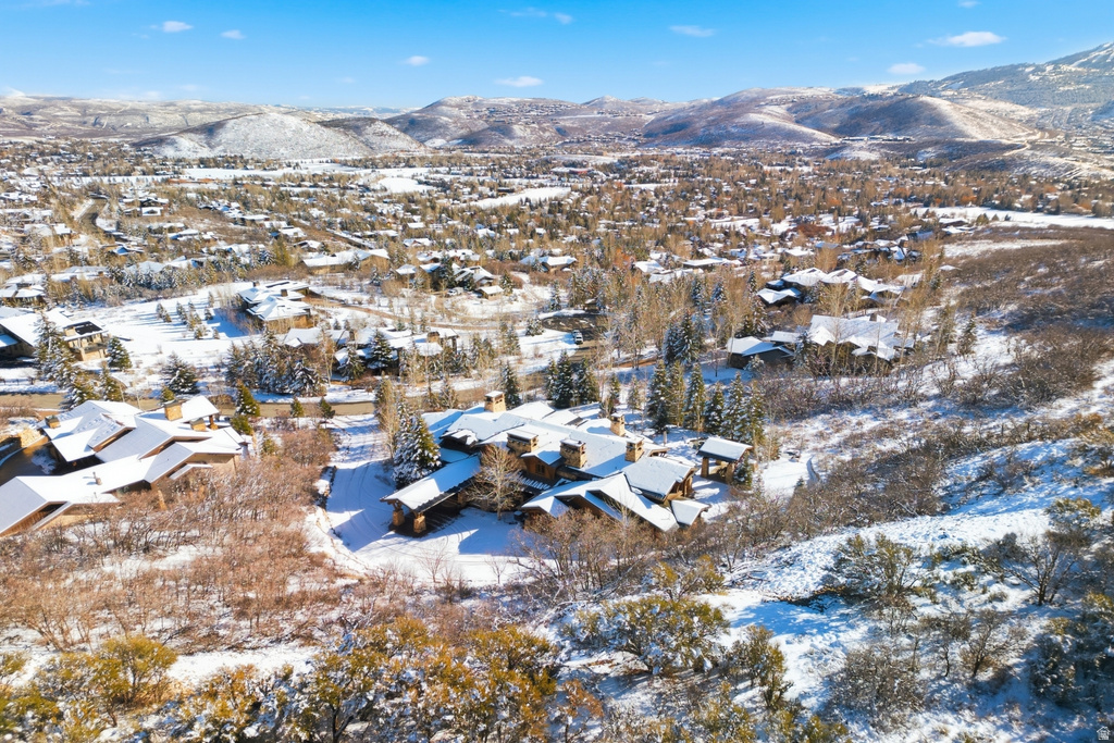 Mountain landscape featuring a large multi-structure property with extensive grounds