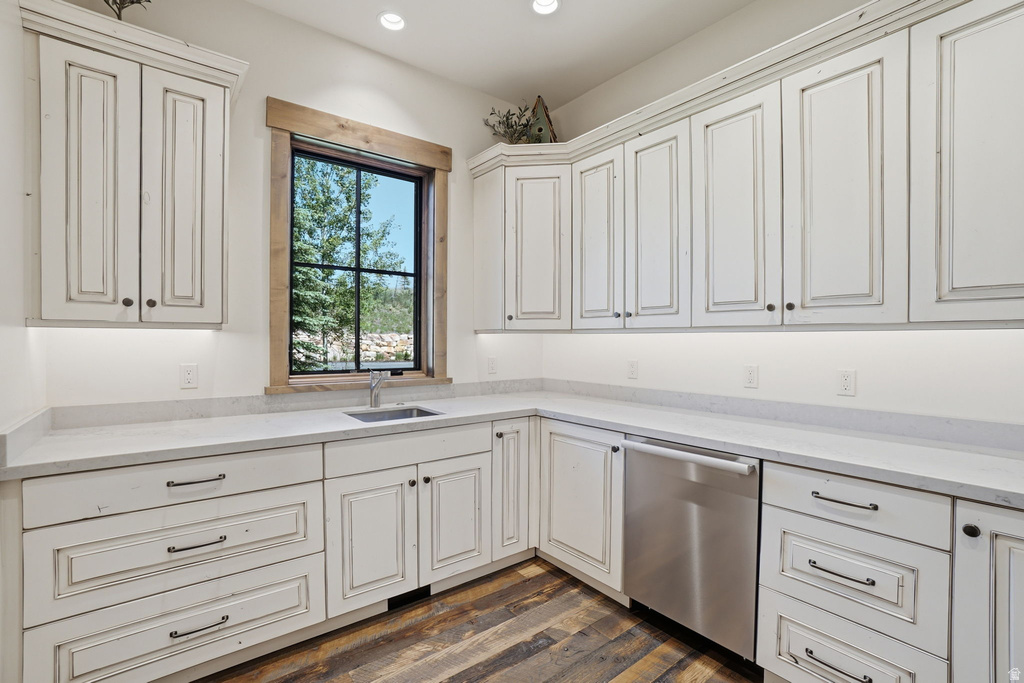 White shaker-style cabinetry with dark hardware