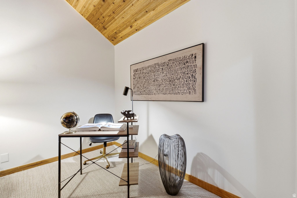 Vaulted wood-paneled ceiling with white walls
