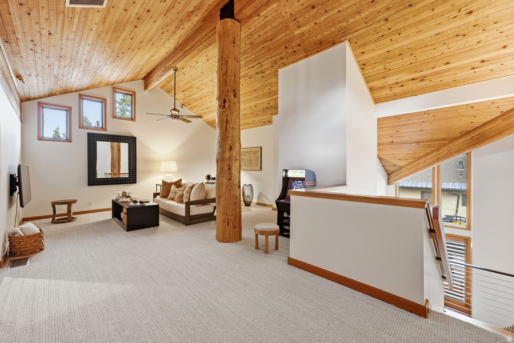 Vaulted wood-finish ceiling with exposed beams