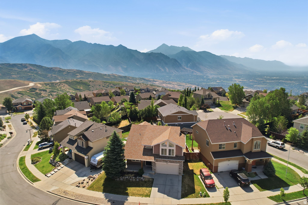 Established residential neighborhood featuring mature trees and expansive mountain scenery
