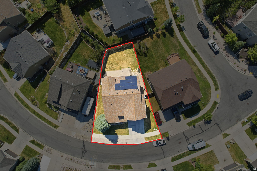 Aerial view of a residential property with a partial cul-de-sac