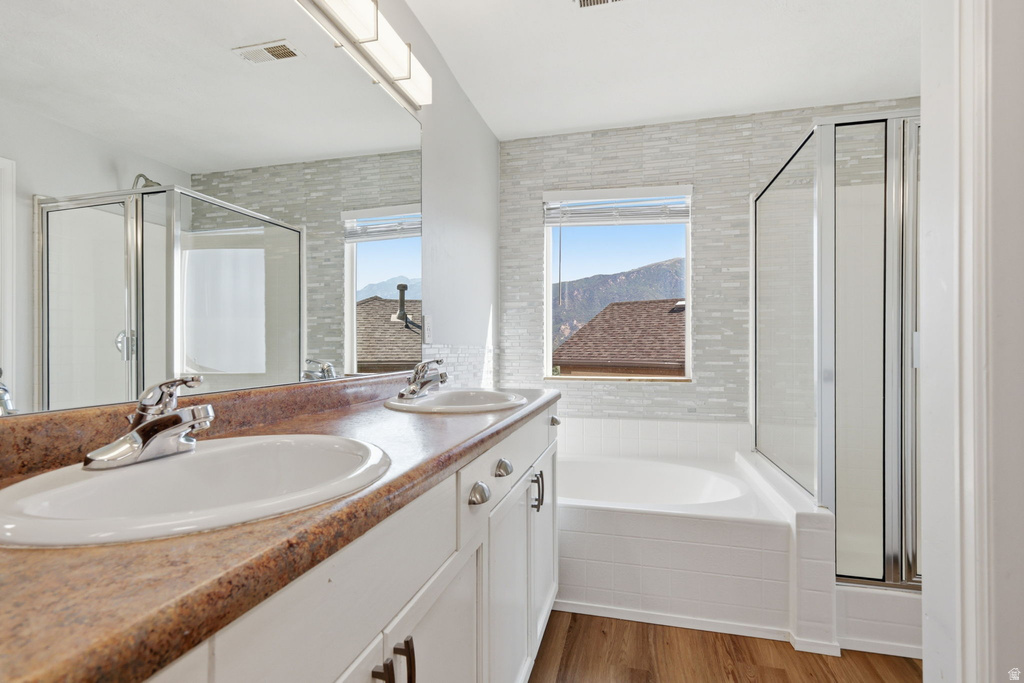 Double vanity featuring integrated sinks and chrome fixtures