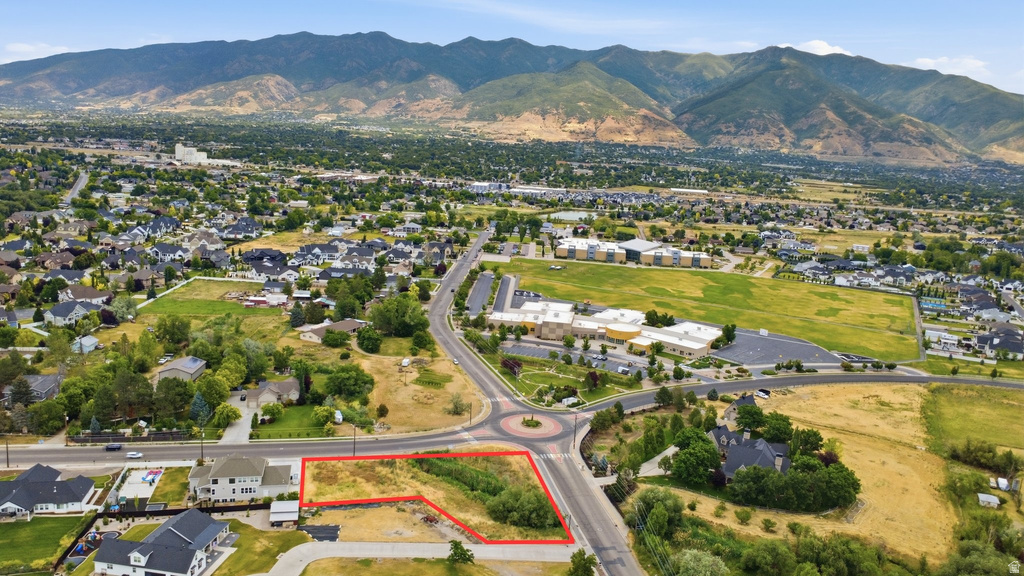 Expansive land parcel outlined in red, featuring natural vegetation