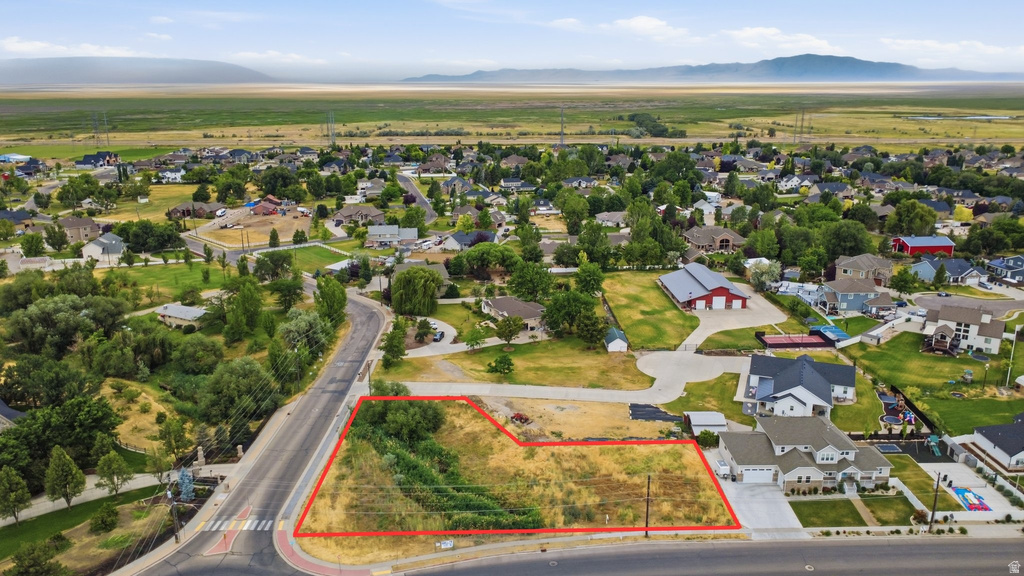 Expansive raw land parcel featuring a visible road frontage