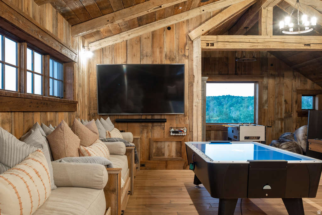 Vaulted wood-paneled ceiling with exposed beams
