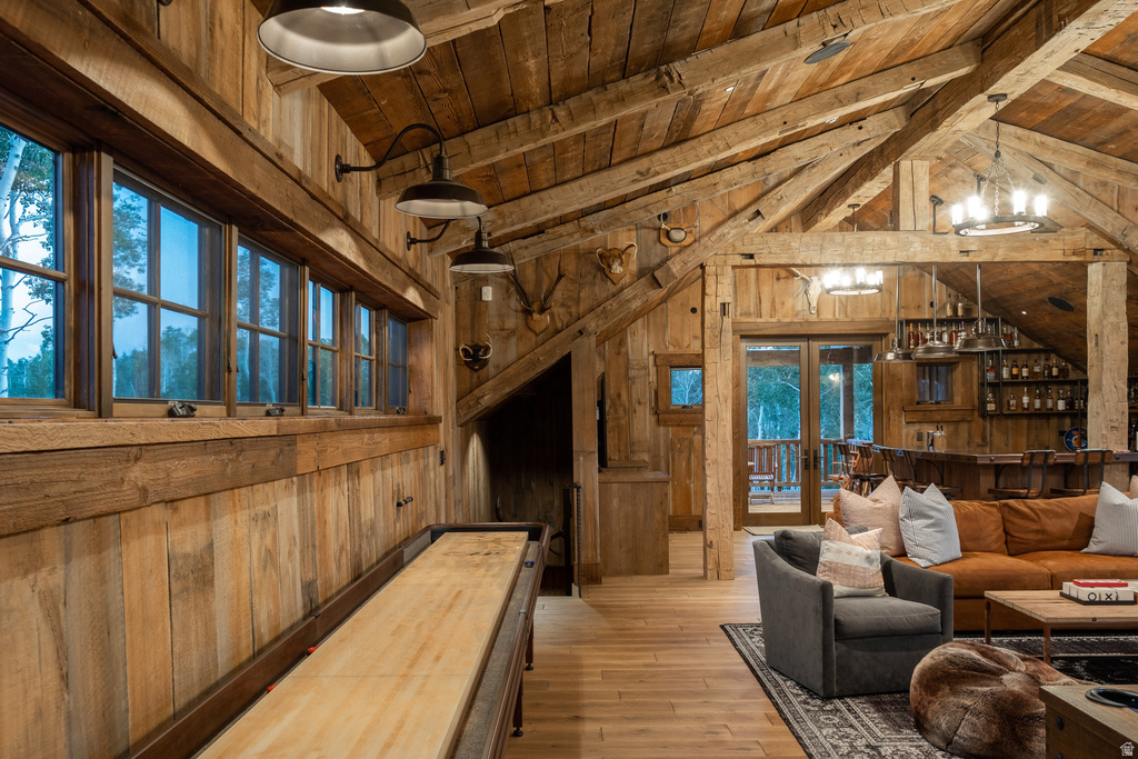 Vaulted wood plank ceiling with exposed wood beams