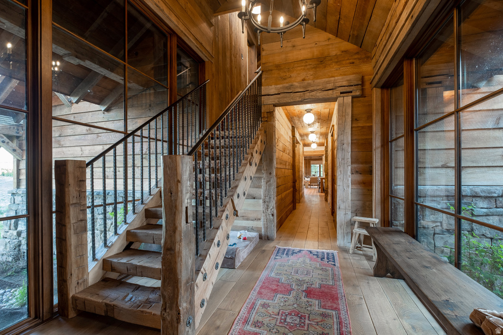 Rustic wood-plank walls and ceiling featuring exposed beams