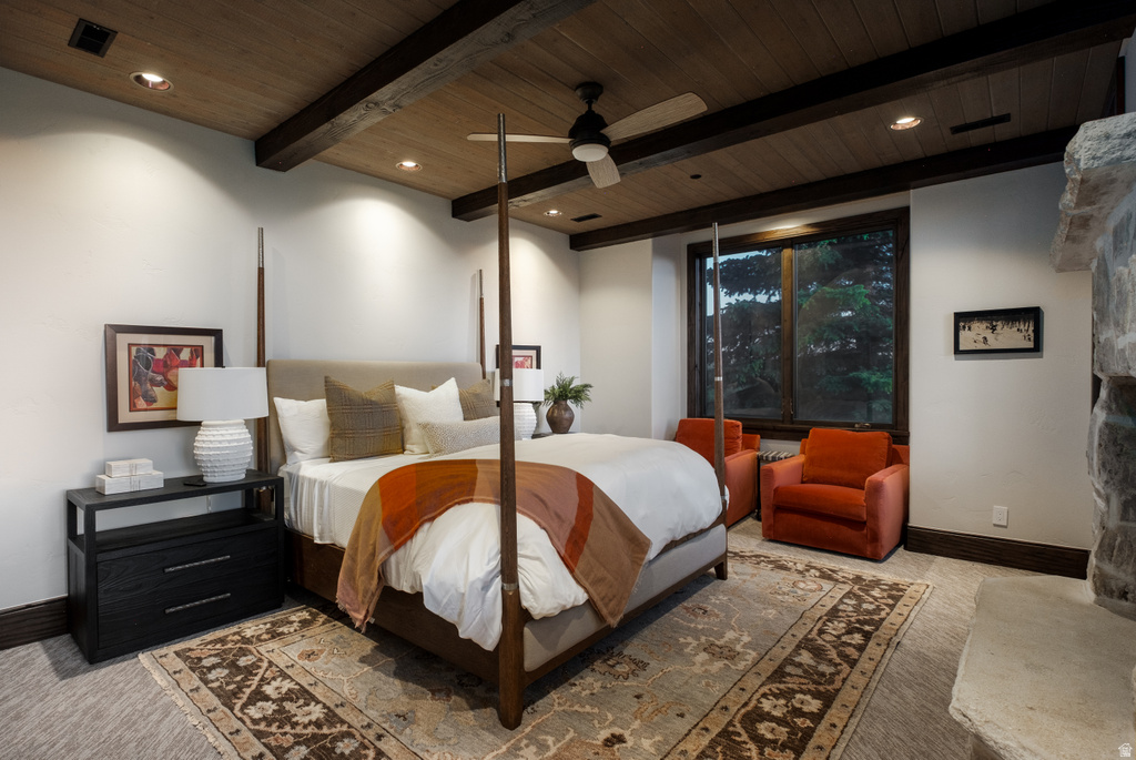 Wood-paneled ceiling with exposed beams