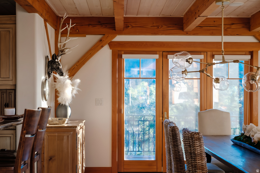 Vaulted wood-plank ceiling with exposed wood beams