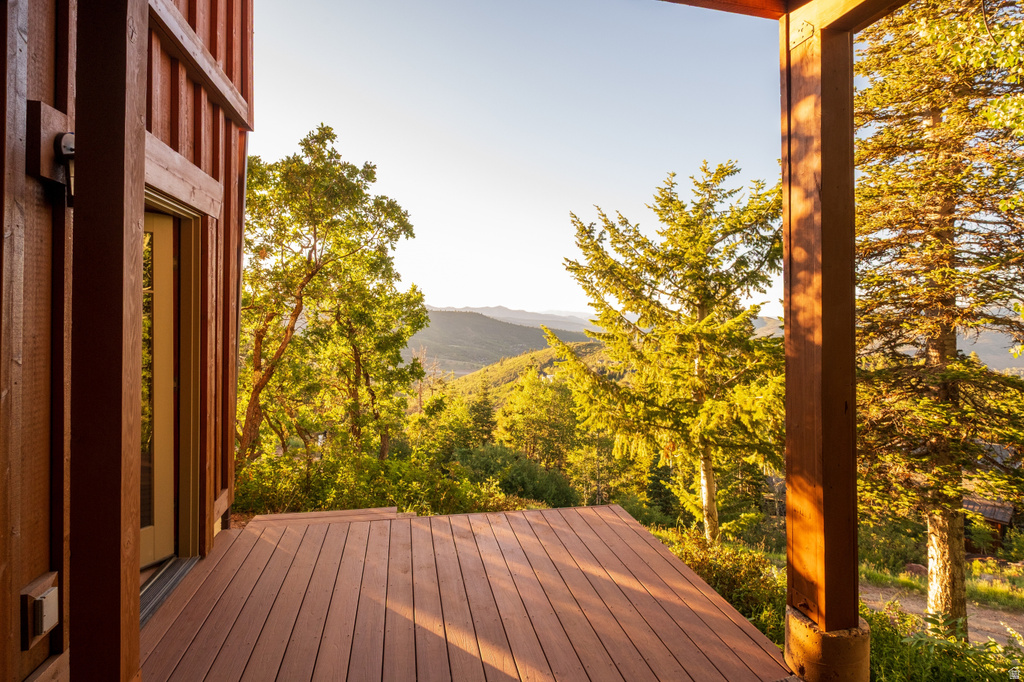 Inviting outdoor deck crafted from composite decking, offering expansive mountain scenery