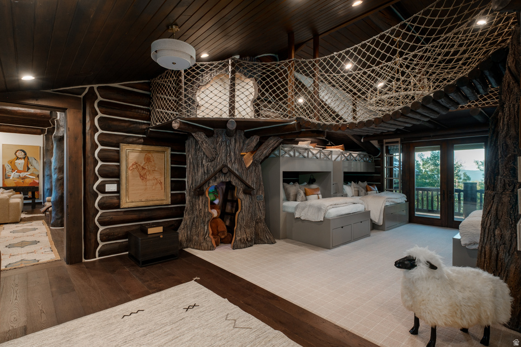 Wood-paneled ceiling with recessed lighting