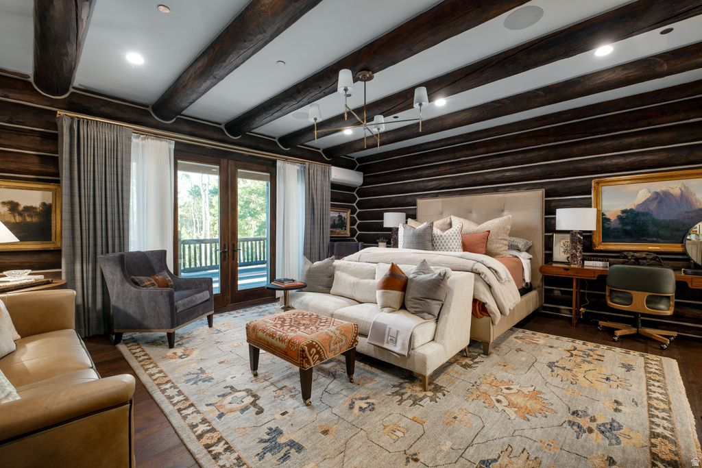 Rustic-inspired room featuring exposed wood ceiling beams and log walls