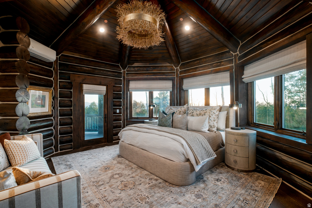 Rustic log cabin interior featuring dark wood walls and vaulted wood ceilings