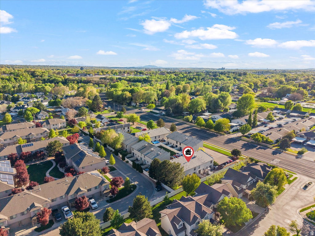 Aerial perspective showcasing a residential community with mature landscaping