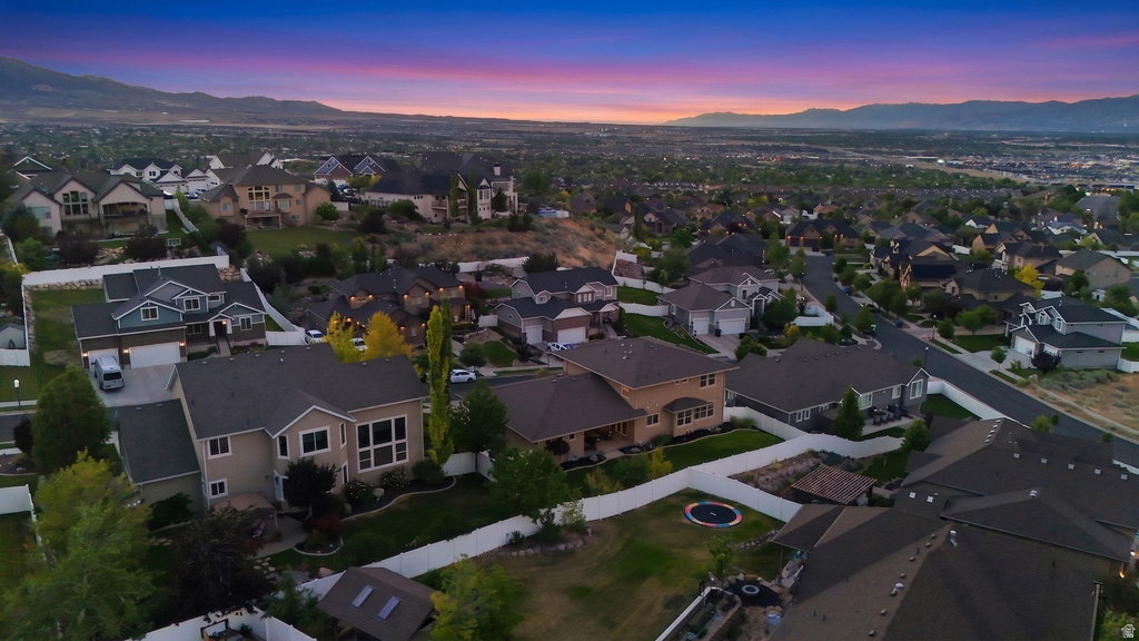 Residential neighborhood featuring varied architectural styles and mature landscaping