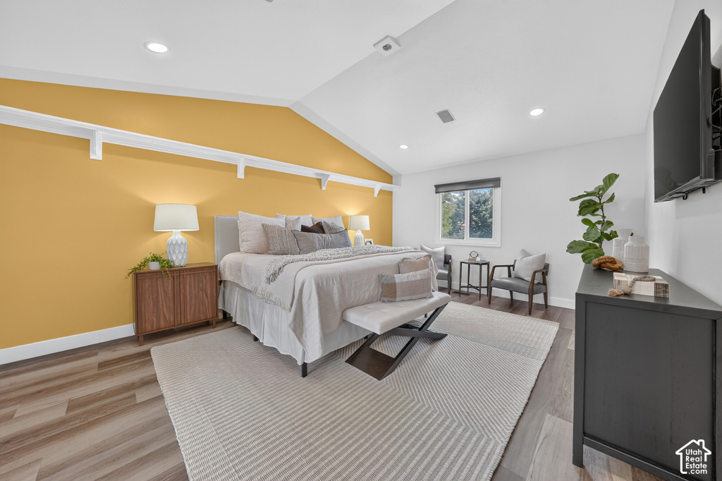 Vaulted ceilings complement the wood-finish flooring