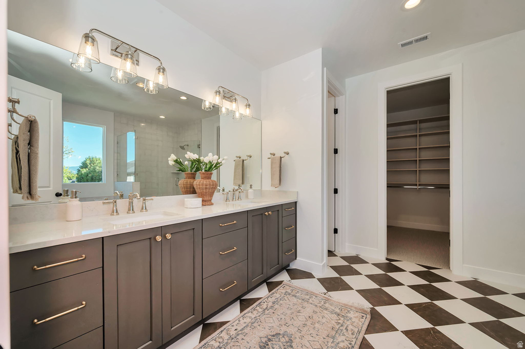 Dual vanity with quartz countertop and undermount sinks
