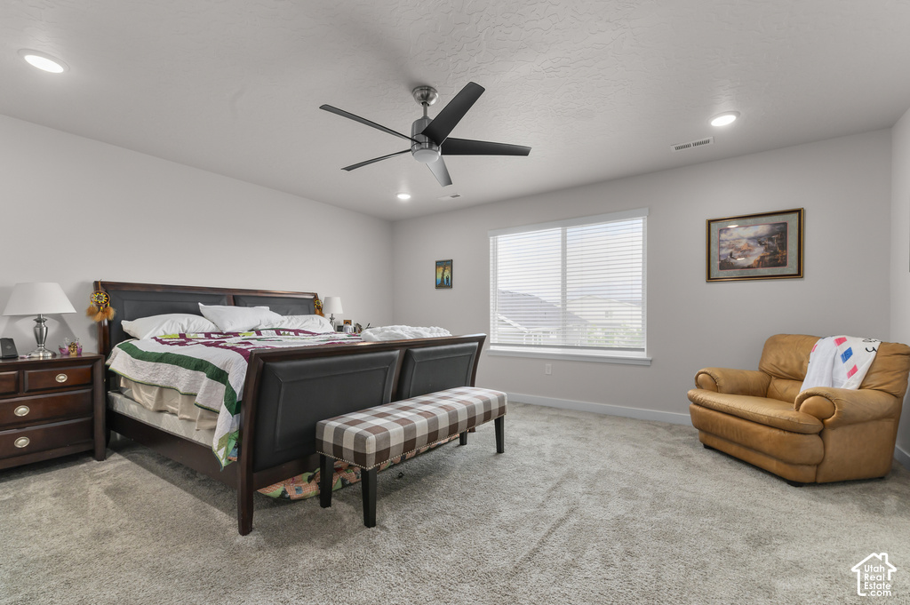 Spacious room featuring neutral carpeting and light-toned walls