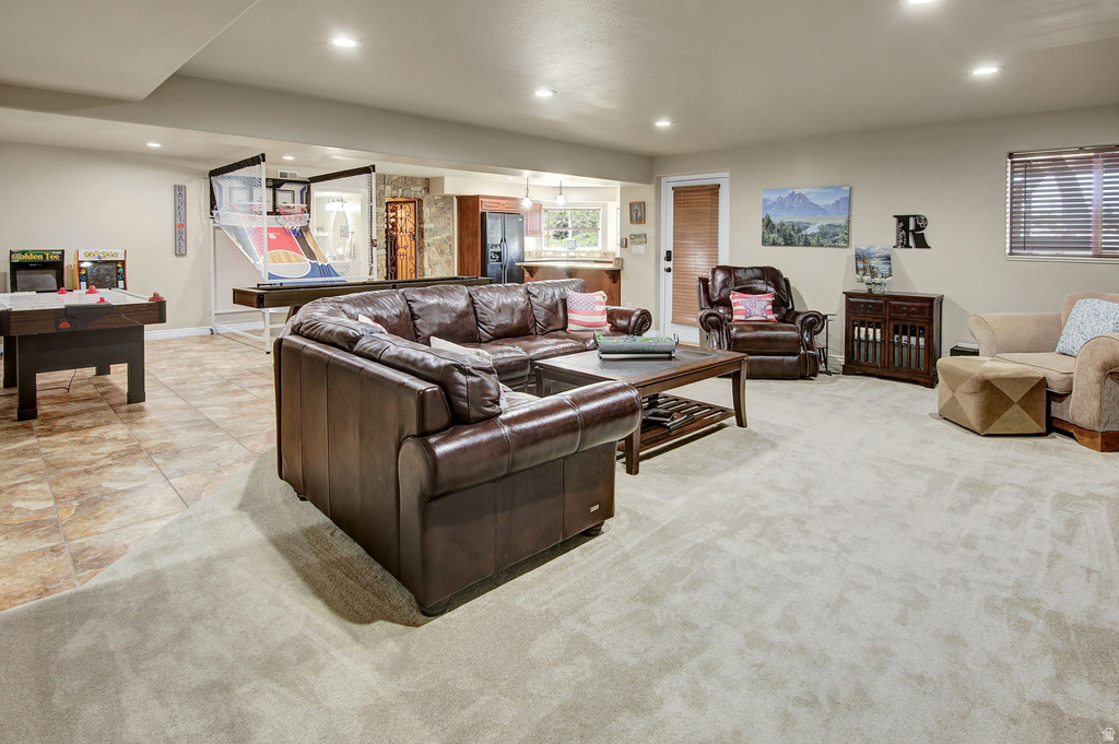 Spacious lower level featuring plush carpeting and recessed lighting