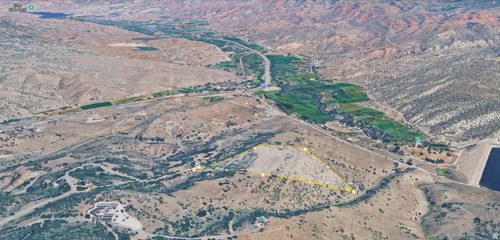 Expansive undeveloped hillside property offering a prominent location with direct access to a paved road