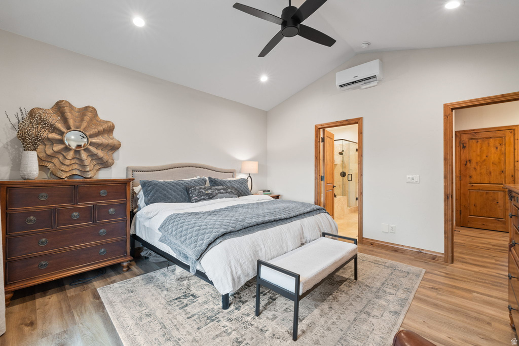 Vaulted ceilings featuring recessed lighting and a ceiling fan, wood-finish flooring, and solid wood interior doors