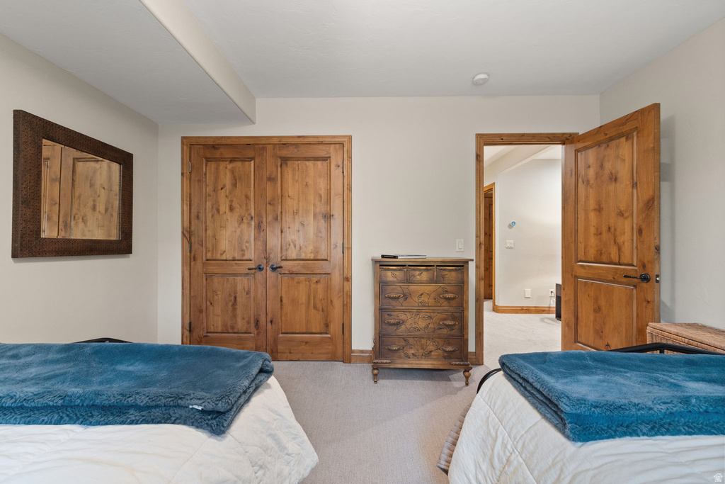 Interior space featuring light-toned walls and carpet flooring