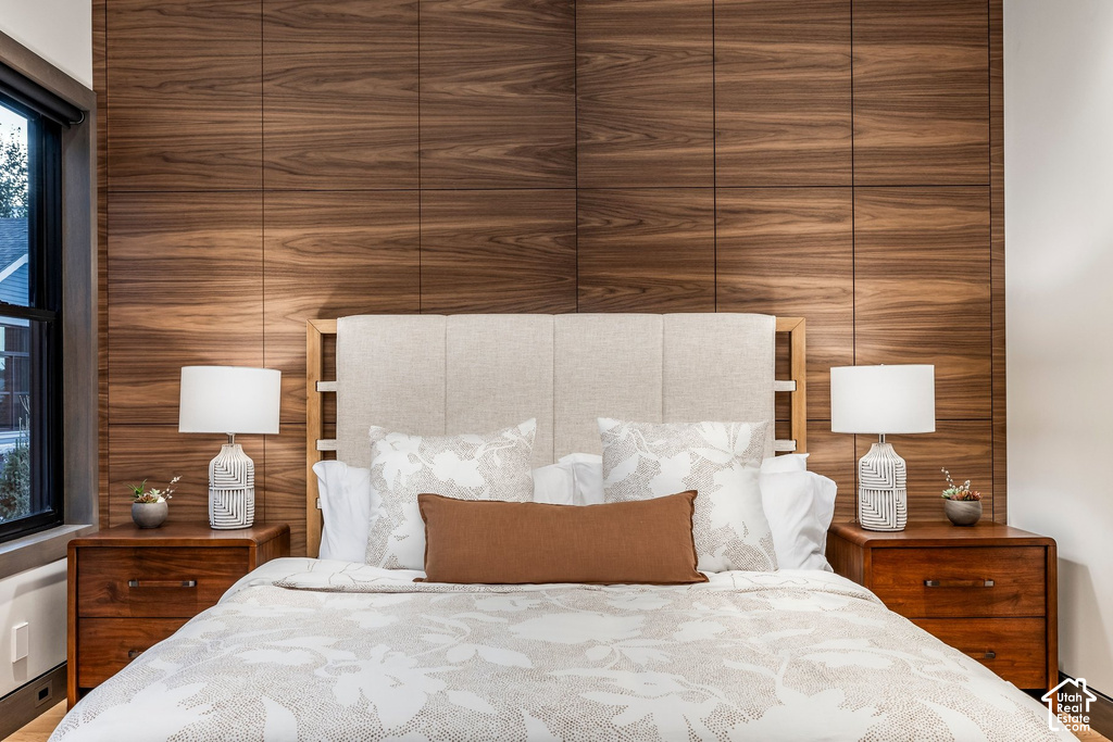 Accent wall featuring warm wood paneling