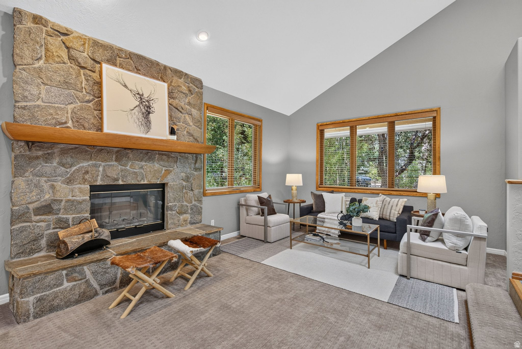 Stone fireplace with a substantial timber mantel
