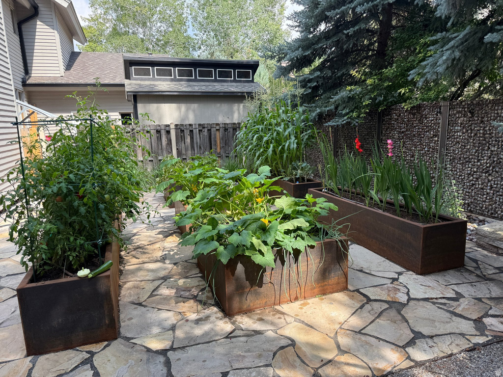 Outdoor living area featuring irregular flagstone paving